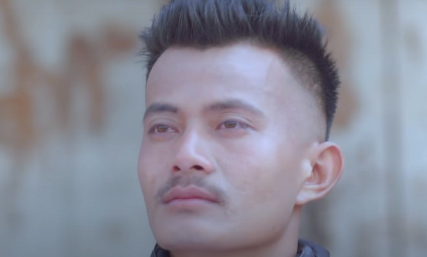 राष्ट्रिय झन्डा जलाएको गीतको म्युजिक भिडियो खिच्‍ने क्यामेराम्यान पक्राउ , गायक मंगोल ग्याल्जीको खोजीमा प्रहरी