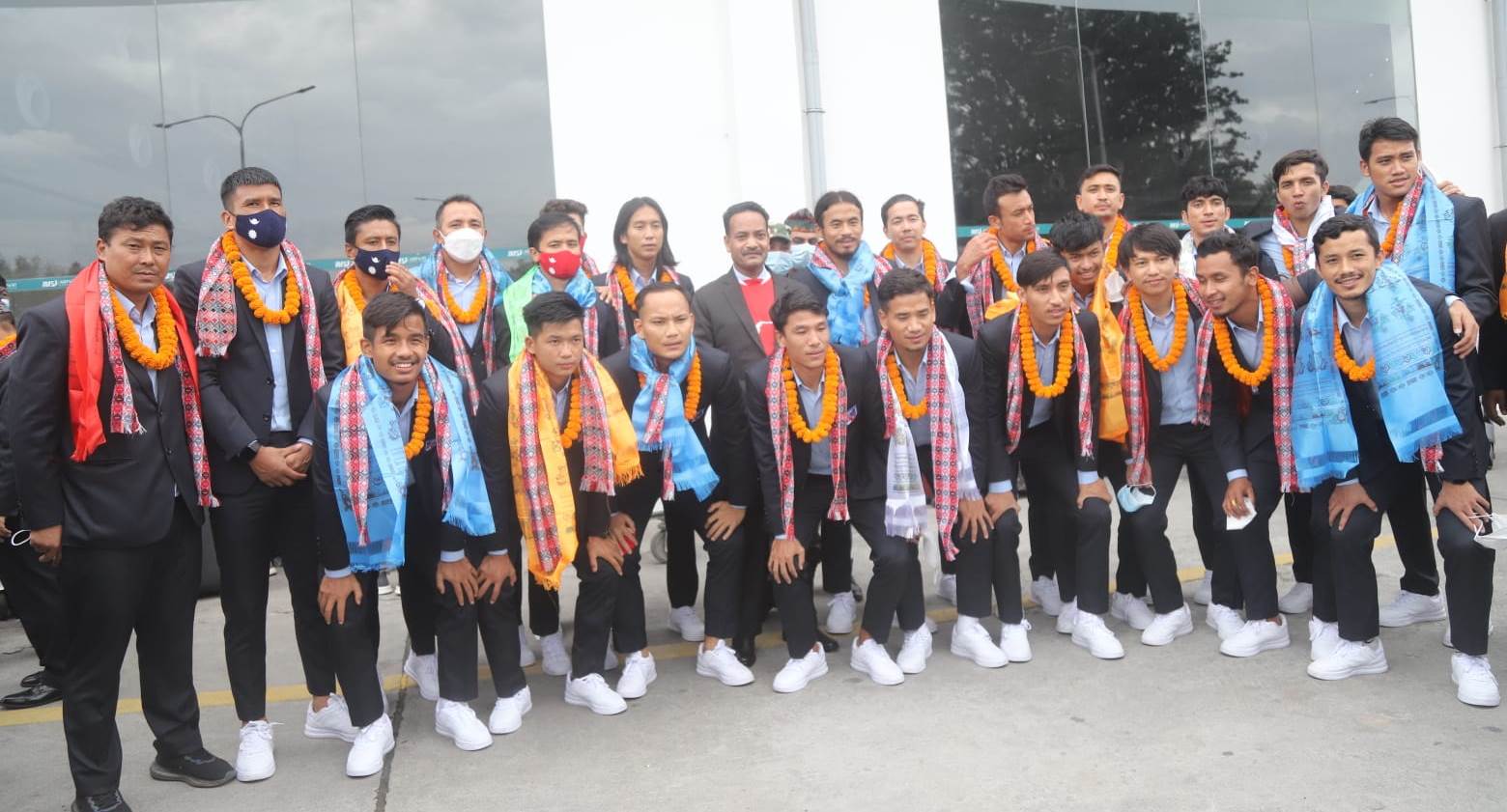 National football team returns home with first-runner up trophy