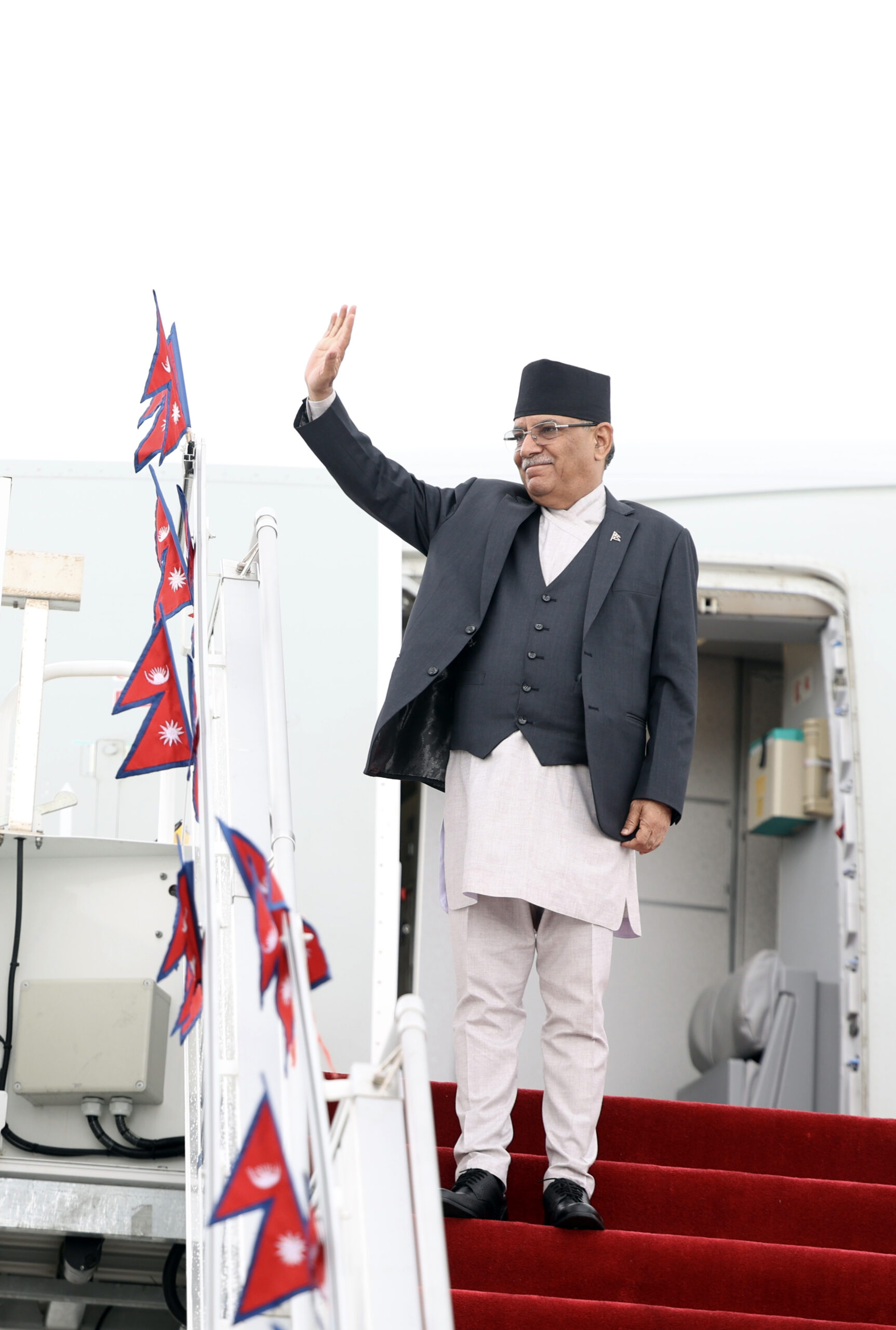 PM Prachanda returns home